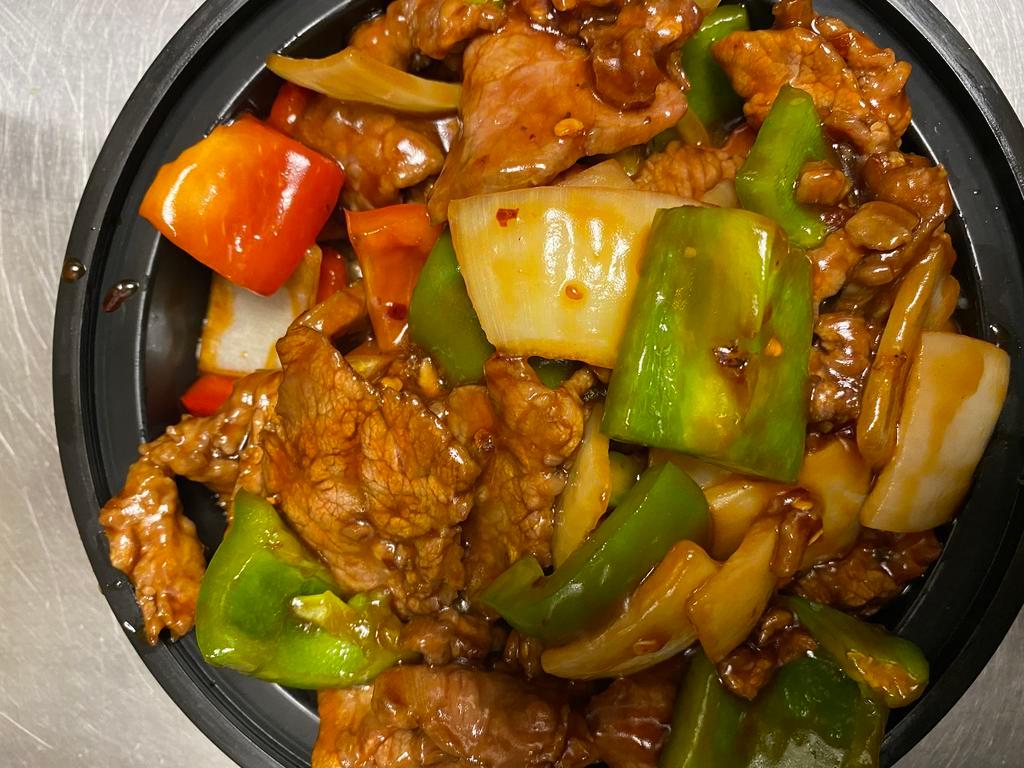 Pepper Steak · Bell peppers, onions and garlic brown sauce. 