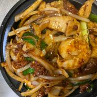 Mongolian Triple · Chicken, beef, shrimp, onions, jalapeno, spicy