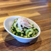 Cucumber Salad · Cucumber slices, kanikama, sesame seeds, umeponzu dressing.