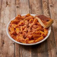 Pasta with Vodka Sauce · Prosciutto ham, aged Romano cheese, fresh garlic and basil in a creamy vodka sauce. Served w...