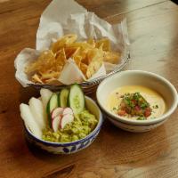 Queso & Chips · four cheese blend with sour cream and chives. Includes Nada's signature chips.