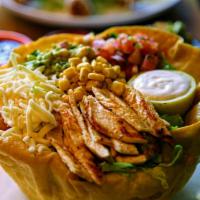 Grilled Chicken Taco Bowl · Crispy flour tortilla in shape of a bowl with Romaine, mozzarella cheese, sour cream, pico d...