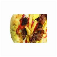 Bacon Cheeseburger Pizza · 1000 island dressing, mozzarella, bacon, hamburger, fresh tomatoes, onions, french fries, an...