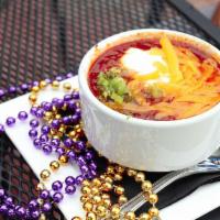 Smoked Brisket Chili  · Cup or bowl. Award-winning, house-made chili topped with cheddar cheese, sour cream and gree...