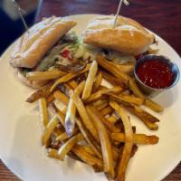 Chicken Philly · grilled boneless chicken breast topped with peppers, sweet onions, mushrooms and provolone c...
