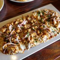 BBQ Chicken Pizza · Smoked Chicken, red onions, Kansas City BBQ, 
mozzarella, garnished with fresh cilantro