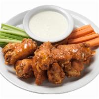 Italian Hot Wings (8) · Our version of buffalo wings! fire-roasted and tossed in our homemade spicy buffalo wing sau...