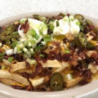 Beer Cheese Fries · Karl Strauss Red Trolley Ale beer cheese, hand cut fries, bacon, jalapeño, sour cream, scall...