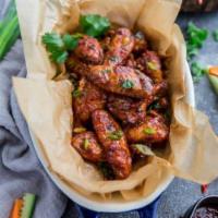 Baked 6  Achari  Chicken Wings  · Baked Boldy spiced Chicken Wings made here with delicious ranch dressing 