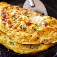 Omelette · Ham and cheese Omelette with toast
