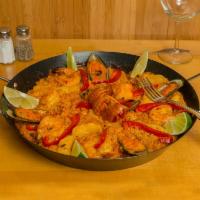 Spanish Seafood Rice / Paella · Paella. Mixed seafood, lobster, shrimp rice and vegetables. Deliciosa Paella con langosta, c...