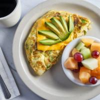 Veggie Omelette · Eggs, tomatoes, bell pepper, onions, mushrooms and cheese. Served with toast and choice of s...