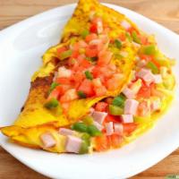 Western Omelette · Eggs, ham, pepper, onions and cheese. Served with toast and choice of side. 