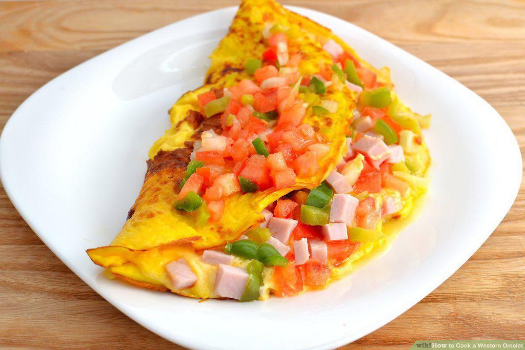 Western Omelette · Eggs, ham, pepper, onions and cheese. Served with toast and choice of side. 