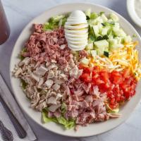 Chef Salad · Served with lettuce, tomatoes, cucumbers, roast beef, turkey, ham, Swiss cheese and hard boi...