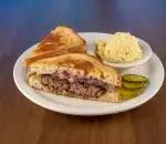 1/2 lb. Swiss Patty Melt Burger · Served with cheese and onions, Served with fries, onion rings, potato salad, cottage cheese,...