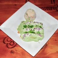 Enchiladas Guac · 3 chicken enchiladas with guacamole sauce. Topped with red onions, cilantro and queso fresco...