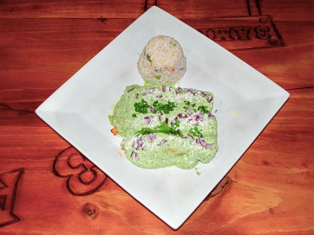 Enchiladas Guac · 3 chicken enchiladas with guacamole sauce. Topped with red onions, cilantro and queso fresco. Served with white rice.
