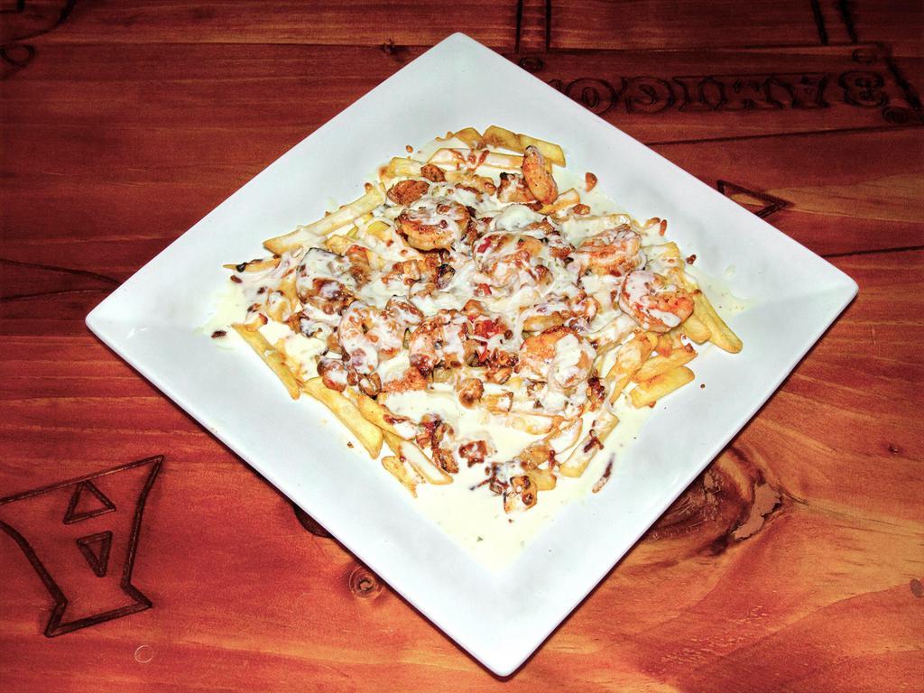 Shrimp Fries · Garlic, shrimp, and crab on top of a bed of fries with our own seasoning.