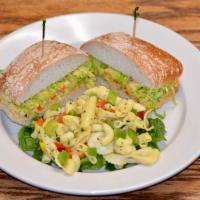 Chickpea Club Sandwich · Ciabatta with chickpea spread, lettuce, cucumbers, tomatoes, bell peppers, green onions, cel...