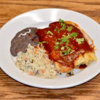 Veggie Enchiladas · Potato, black bean filling, 7 red Chile sauce with wild rice fiesta.