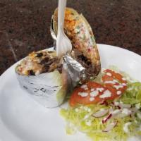 Burritos de Bistec · Served with choice of tortilla, steak, cheese, sour cream, pico de gallo, rice and beans.