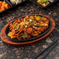 Osam Bulgogi · Stir-fried pork and squid in spicy sauce. Spicy.
