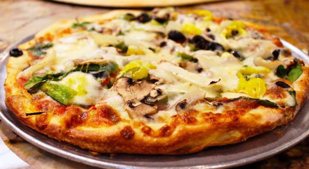 Veggie Pizza · Red Sicilian sauce, mozzarella cheese, spinach, mushrooms, onions, green pepper, black olives, banana peppers and feta cheese.