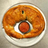 Cheese Calzone · Made with Mozzarella and Ricotta cheese.
Includes a side of Marinara sauce.