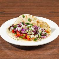Single Tacos · Flour tortilla topped with your choice of chopped cilantro and onions or lemon-flavored cabb...