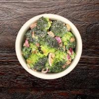 Broccoli Salad · Our house-made recipe combines broccoli florets with bacon bits, sunflower seeds and diced r...
