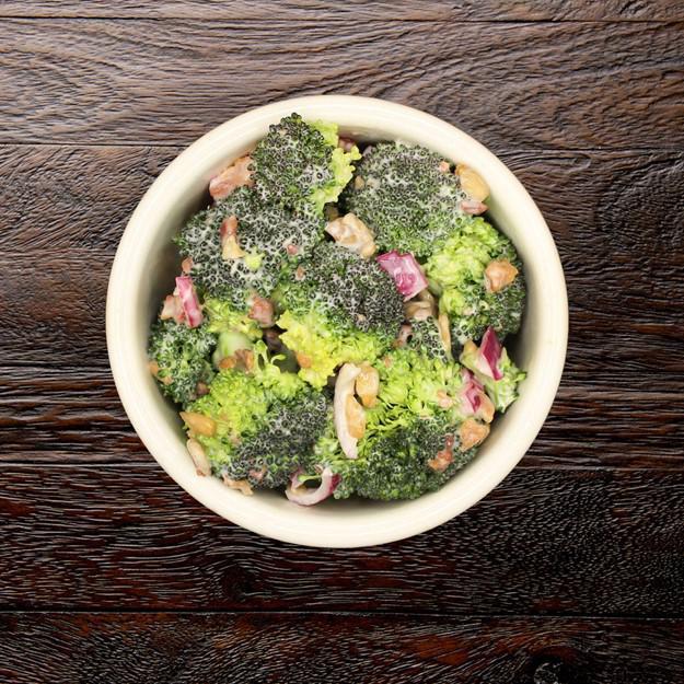 Broccoli Salad · Our house-made recipe combines broccoli florets with bacon bits, sunflower seeds and diced red onion with a creamy red wine vinegar dressing.