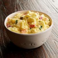 American Potato Salad · A deli classic featuring baked potatoes, red and green onions, hard-boiled eggs, bell pepper...