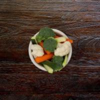 Steamed Veggies · A healthy blend of steamed broccoli, cauliflower, zucchini and organic baby carrots.