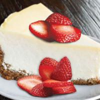 Strawberry-topped Cheesecake · Classic cheesecake topped with strawberries.