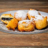 BOARDWALK COOKIES · (5) battered cookies deep-fried until golden brown and optionally topped with sugar and syru...