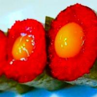 Tobi-Tama Nigiri · Tobiko with quail egg.  2 pcs
