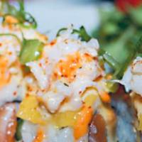 Mango Madness Roll - 8pc · 8 pieces. Spicy Salmon and Asparagus topped with Mango, Kani (Real Crab) and Fuji sauce