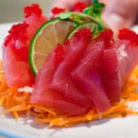 Maguro (Red Tuna) Sashimi - 8 pc · Premium #1 Japanese Red tuna. Served with assorted vegetables