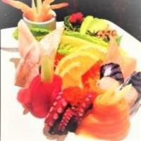 Combo Sashimi - 12+ pc · 12+ pieces of assorted sashimi.  Served with assorted vegetables. (No substitution please)
