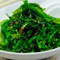 Seaweed Salad · Hiyashi wakame.  Cold seaweed strips and clear noodles marinated in sweet, savory dressing.