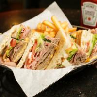 Club Charlies Wacky Club Sandwich · Roast beef, ham, American cheese, lettuce, tomato, onion and pickles snuggled between 2 pitas.