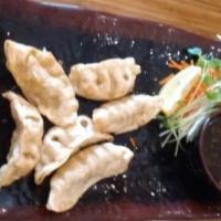 6 Pieces Veggie Gyoza · Japanese dumplings, fried. Vegetarian.