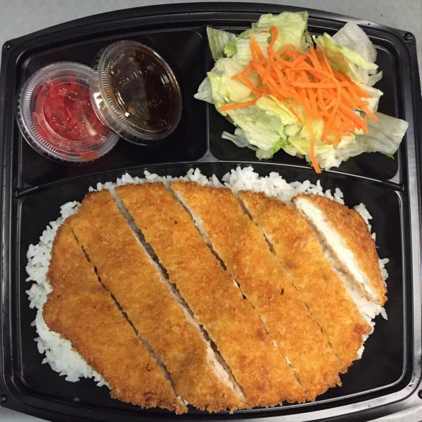 Chicken Cutlet Katsu Curry · Most popular way to enjoy curry in Japan, tender chicken breast cutlet with panko crust, fried golden brown; served with a bowl of our authentic curry.