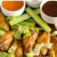 Bone-In Jumbo Wings · Mix of flappers and drums. Choose amongst Buffalo , Spicy garlic butter, teriyaki, Spicy Ter...
