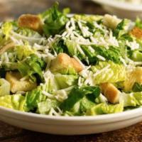 Caesar Salad · Fresh cut romaine, grated and sliced Parmesan cheese and croutons with Caesar dressing.