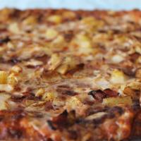 Hawaiian Moon Pizza · Signature forte pizza sauce, ham, pineapple, almonds and cinnamon. Made with our family doug...
