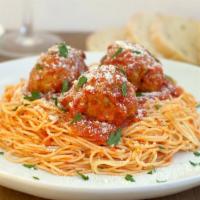 Spaghetti with 2 Meatballs Dinner · Served with 1/2 order garlic bread.