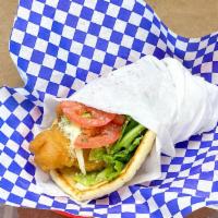 Fish Pita · Grilled or fried flaky white fish with feta, lettuce, onions, tomatoes, pepperoncini’s and d...