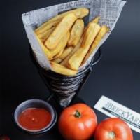 Side Fries · French fries cook until perfection. Picture shows a basket of French fries.